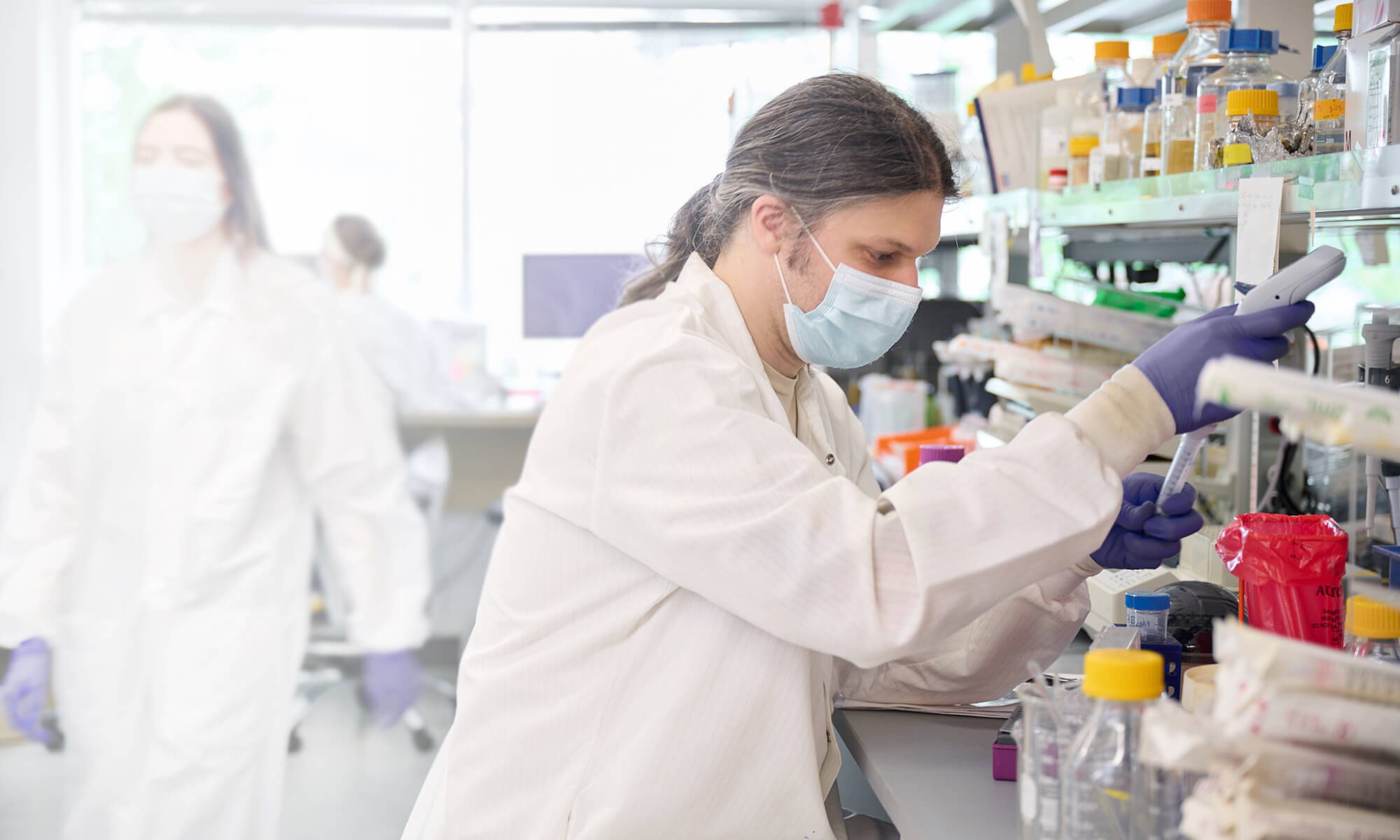 A group of scientists conducting research in a laboratory.