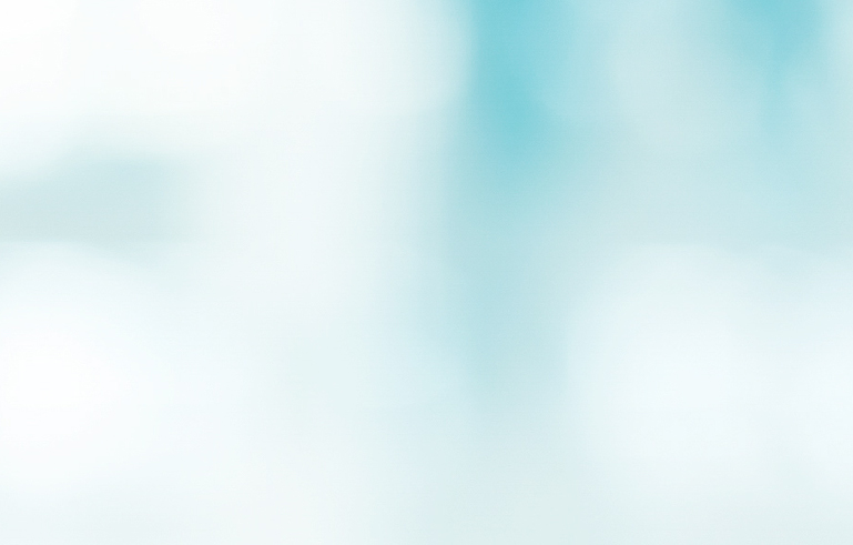 A blue and white blurred background